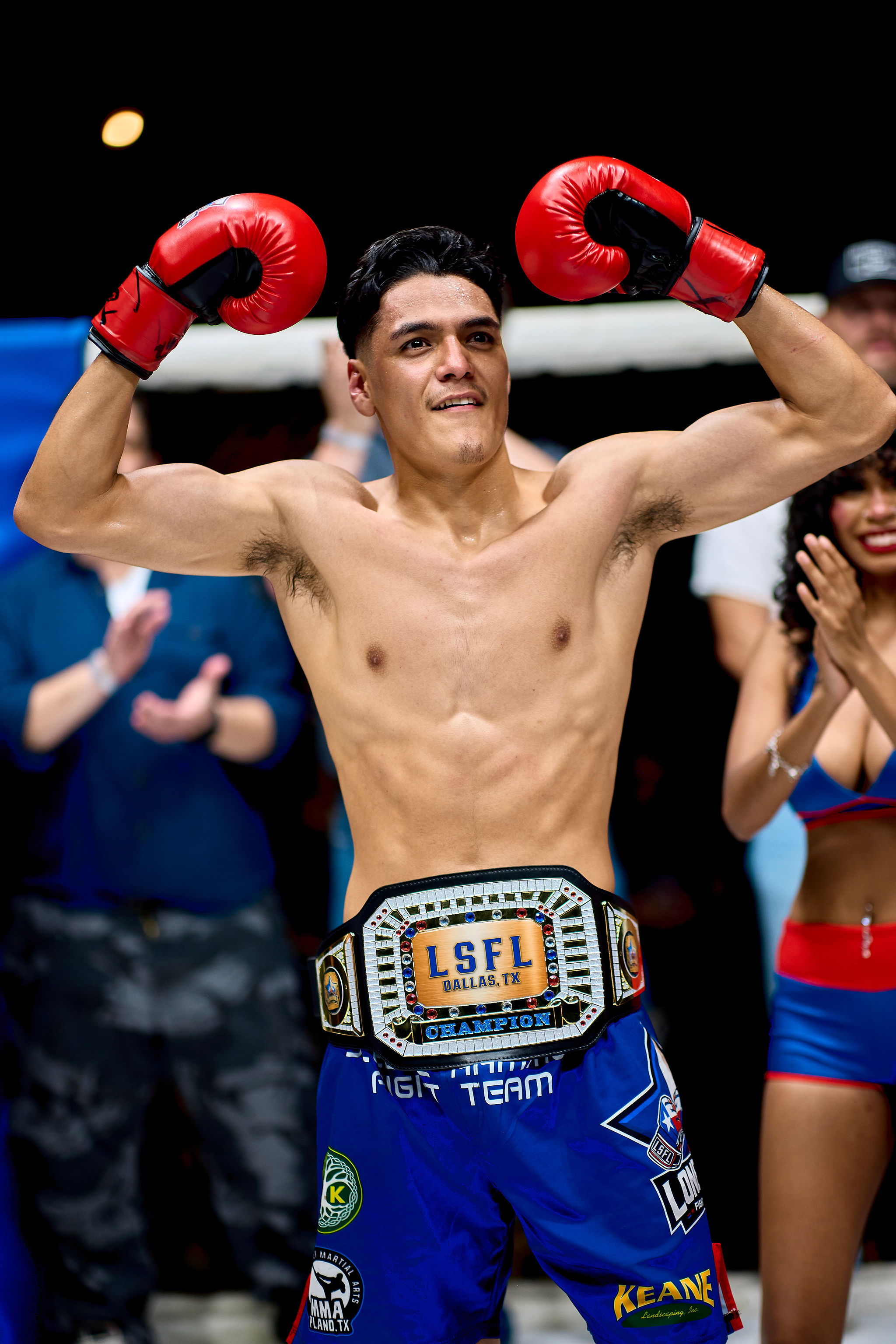 Joseway Noriega with LSFL belt hands raised